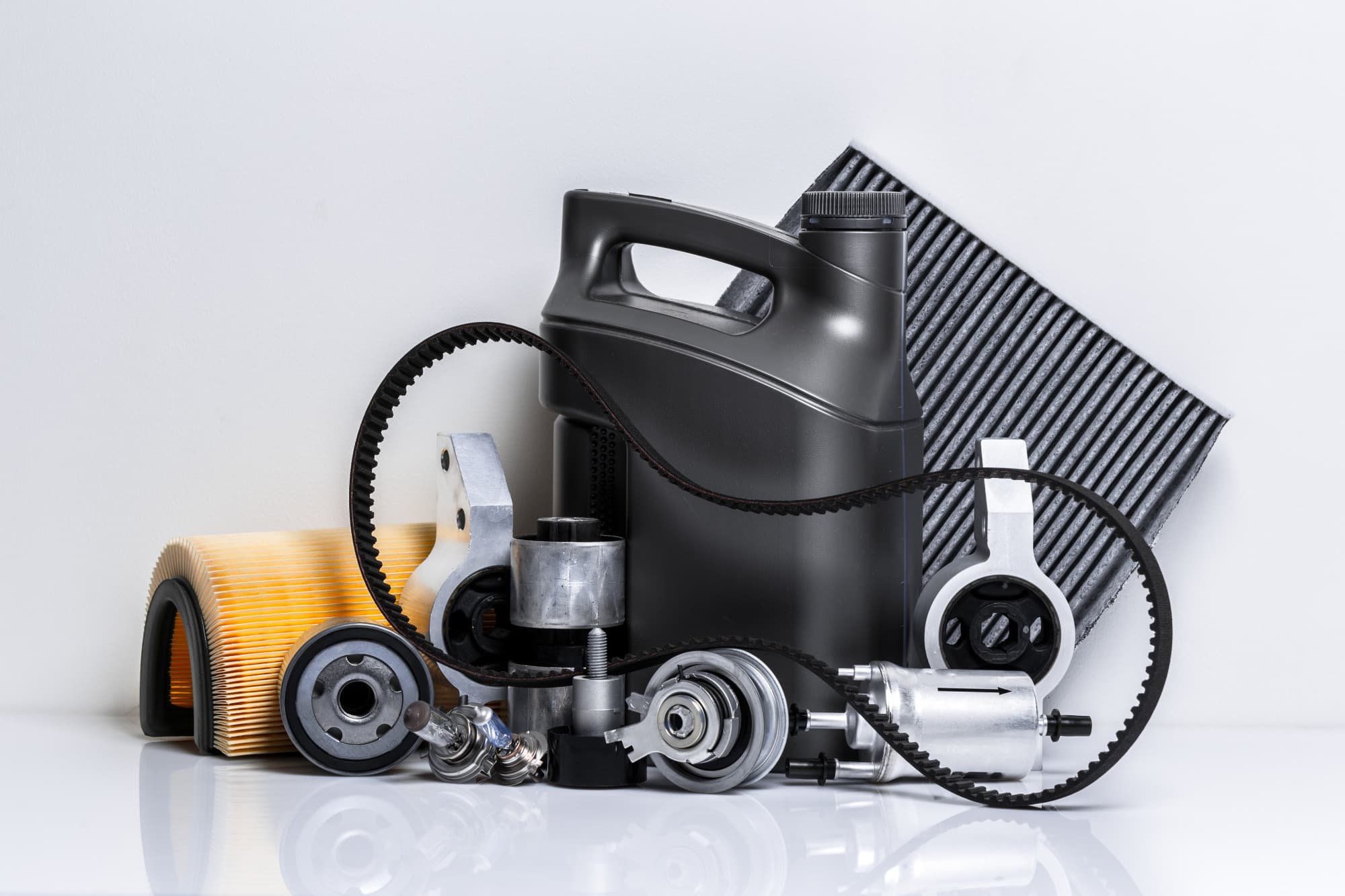 Car parts and oil bottle